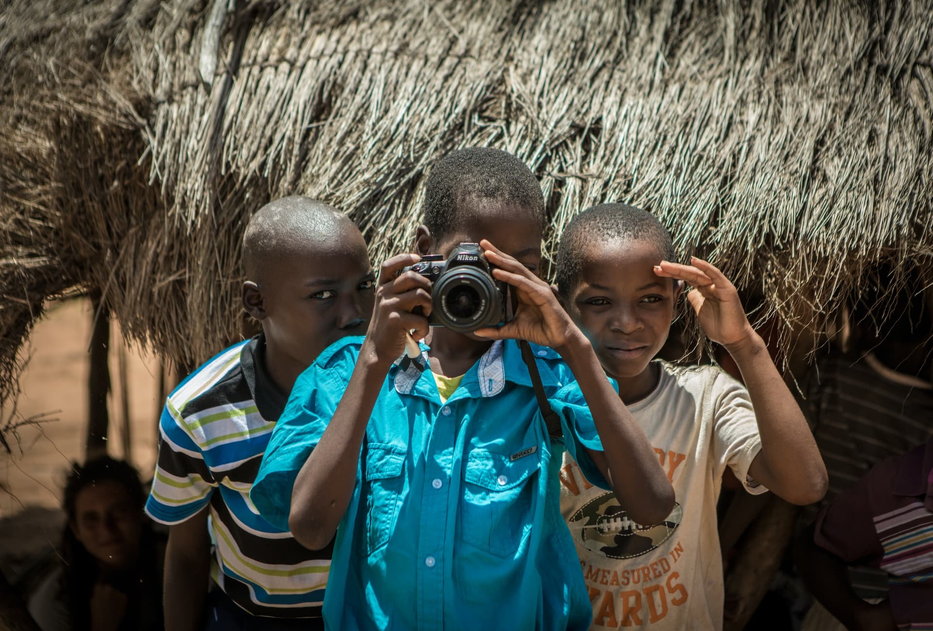 africa children holding camera